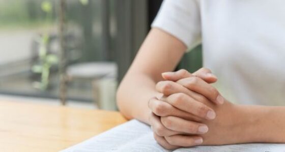 Pray and religion concept, Female christian hands folded and rea Forum Młodych